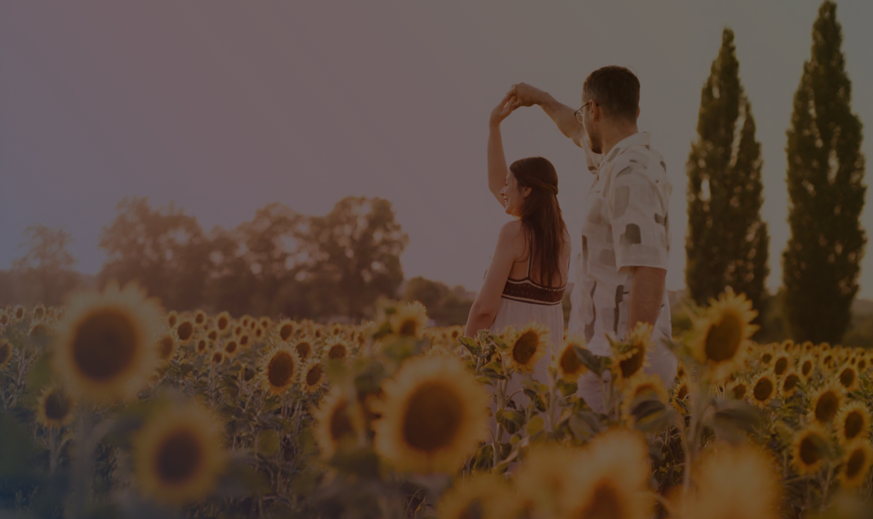 Couple embracing at sunset